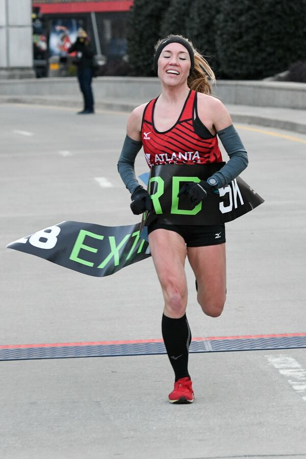 Former UGA runner Bridget Lyons wins the women's division of the Extra Yard 5K. As the women’s winner, she also won one of the three sets of tickets awarded to Monday’s college football national championship game at Mercedes-Benz Stadium.