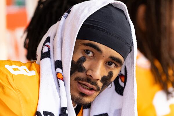 Tennessee quarterback Nico Iamaleava (8) takes a break during the second half of an NCAA college football game against UTEP, Saturday, Nov. 23, 2024, in Knoxville, Tenn. (AP Photo/Wade Payne)