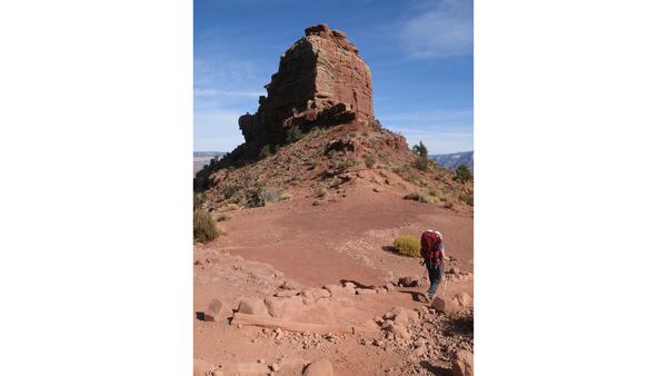 The writer's wife, Dot Kane of La Grange Park, makes her way past O'Neill Butte on the South Kaibab trail. (David Roknic/Chicago Tribune/TNS)