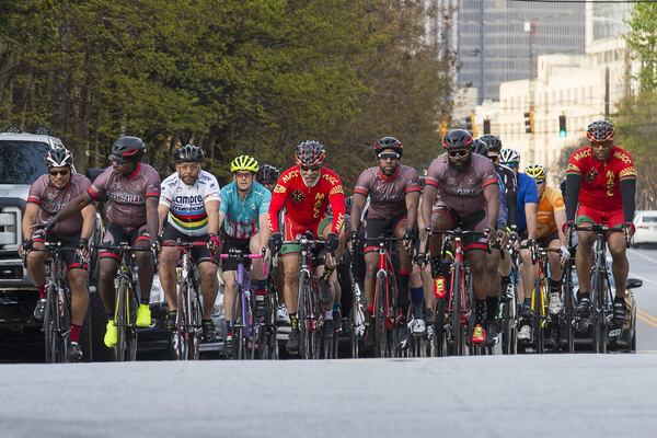 Members of the Velo Atlanta Cycling and the Metro Atlanta Cycling Club bike through Atlanta’s Castleberry Hill neighborhood during their regular Wednesday evening ride. ALYSSA POINTER / ALYSSA.POINTER@AJC.COM