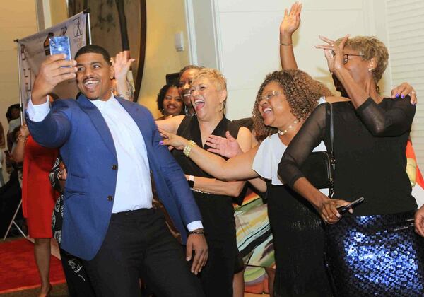 Author Shawn Blanchard and readers enjoy a moment at the NBCC Red Carpet event.