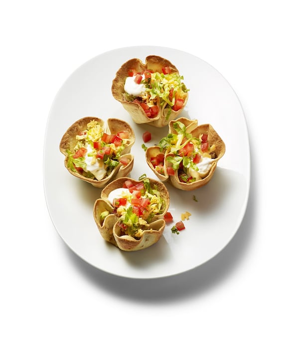 The new Big, Fun Kids Cookbook Contributed by Food Network Magazine features more 150 kid-friendly recipes, including these Taco Salad Cups. Contributed: Levi Brown