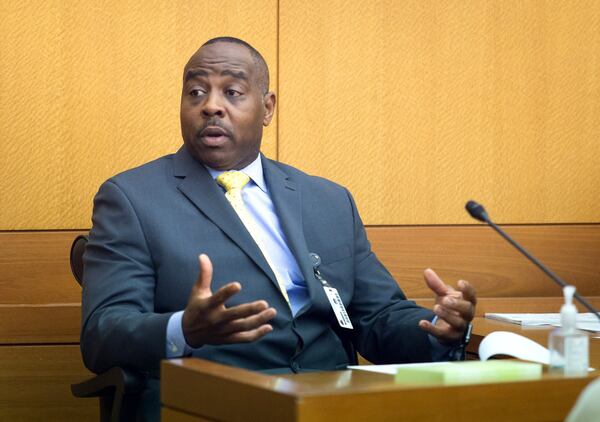 Carven Tyus testifies during Day 4 of the Waffle House chairman sex tape trial at the Fulton County Courthouse on April 6, 2018. STEVE SCHAEFER / SPECIAL TO THE AJC