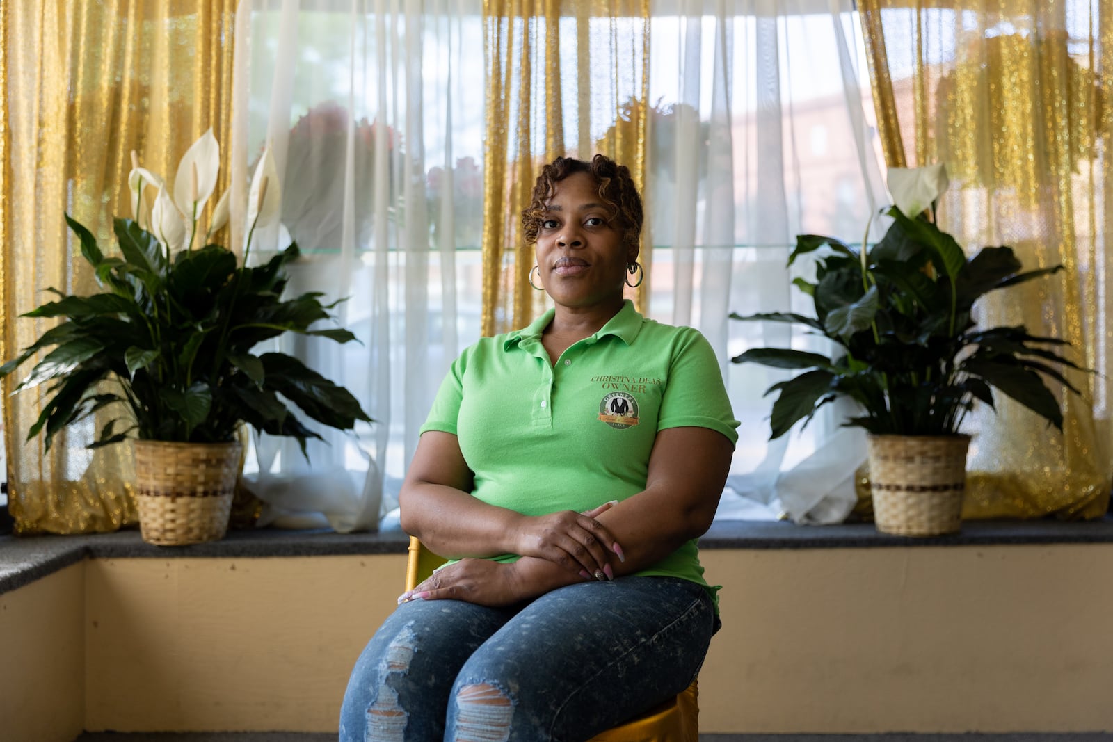 Christina Deas, owner of The Greenery flower and event services shop, poses for a portrait at her business in Fort Valley on Thursday, April 4, 2024. (Arvin Temkar / arvin.temkar@ajc.com)