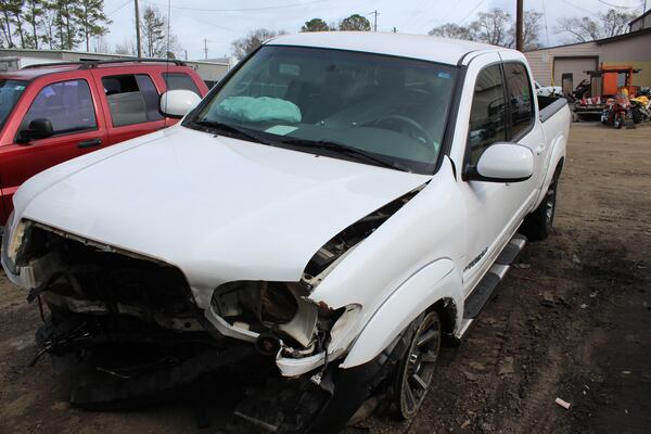 The driver of a blue Mazda Protege had to be freed from his car after the driver of a white Toyota Tundra hit him head-on, Gwinnett police said.