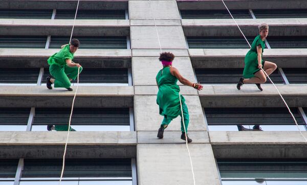 Bandaloop dancers perform on the side of a building facing the Atlanta Beltline on Sunday, October 3, 2021. (Photo: Steve Schaefer for The Atlanta Journal-Constitution)