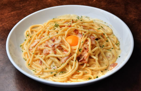 Bucatini Carbonara at Toscano. (Chris Hunt for The Atlanta Journal-Constitution)