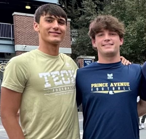 Harrison Faulkner (L) and Jake Bobo are best friends. Faulkner's father, Buster, is offensive coordinator at Georgia Tech. Jake's dad, Mike, coordinates the Georgia Bulldogs' offense. Harrison Faulkner plays quarterback for North Oconee High while Jake Bobo plays quarterback at Prince Avenue Christian School. Rarely are their fathers able to attend their games. (Photo provided by Harrison Faulkner)