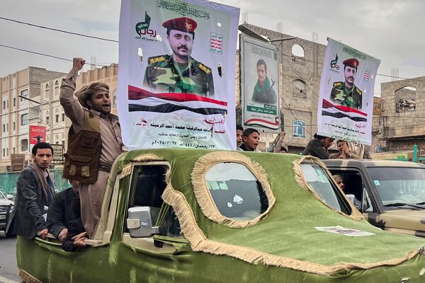 Houthi supporters participate in a funeral procession for Osama Al-rumeitha, a Houthi officer, who was reportedly killed in a recent U.S. airstrike, in Sanaa, Yemen, Monday, March 24, 2025. (AP Photo)