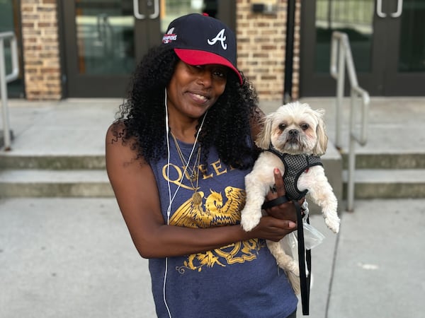 Masika Nyaku stands outside the Cortland Decatur East apartment complex in Decatur, Georgia on June 6, 2024. Nyaku said she was struggling to afford the monthly rent for a two-bedroom apartment in the building. (Matt Reynolds/AJC)