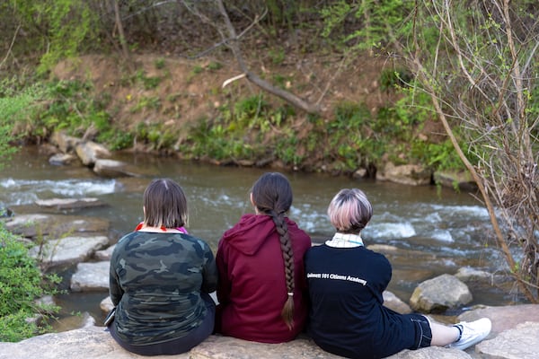 Dare, 16, Matthew, 15, and Jay, 13, of Dacula pose for a portrait on Friday, March 10, 2023. (Arvin Temkar / arvin.temkar@ajc.com)