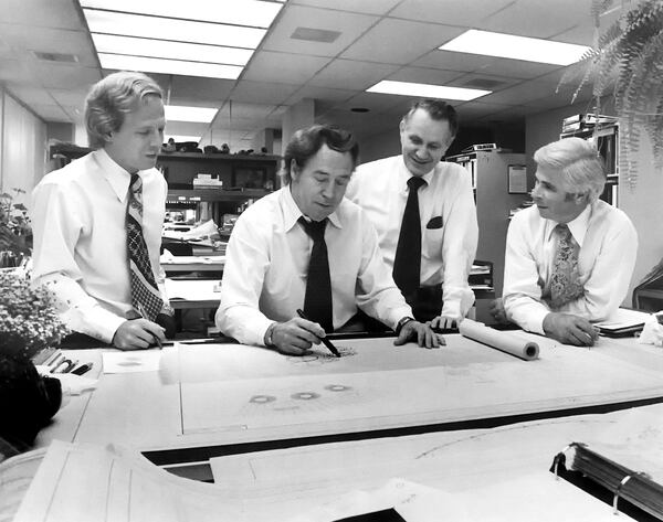 Left to right as follows: Jack Portman, John Portman, John Street and Herb Lembcke with John Portman & Associates working at the drafting table in 1973.  Photo Credit: Special 