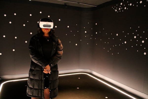 A visitor experiences “The March” virtual reality exhibit at the DuSable Museum of African American History in Chicago ahead of the project’s launch. The exhibit captures the 1963 March on Washington during which Martin Luther King Jr. delivered his famous “I Have a Dream” speech. 