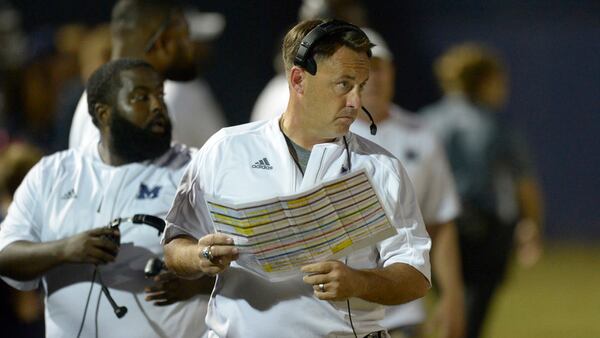 Blue Devils' head coach Richard Morgan looks on from the sidelines in the first half of his game against Hillgrove Friday, Oct. 13, 2017, at Marietta.