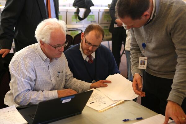 The Atlanta Journal-Constitution and Channel 2 Action News investigative teams look over some of the more than 1.4 million documents released that relate to the City Hall bribery case in Atlanta on Thursday, February 9, 2017. (HENRY TAYLOR / HENRY.TAYLOR@AJC.COM)