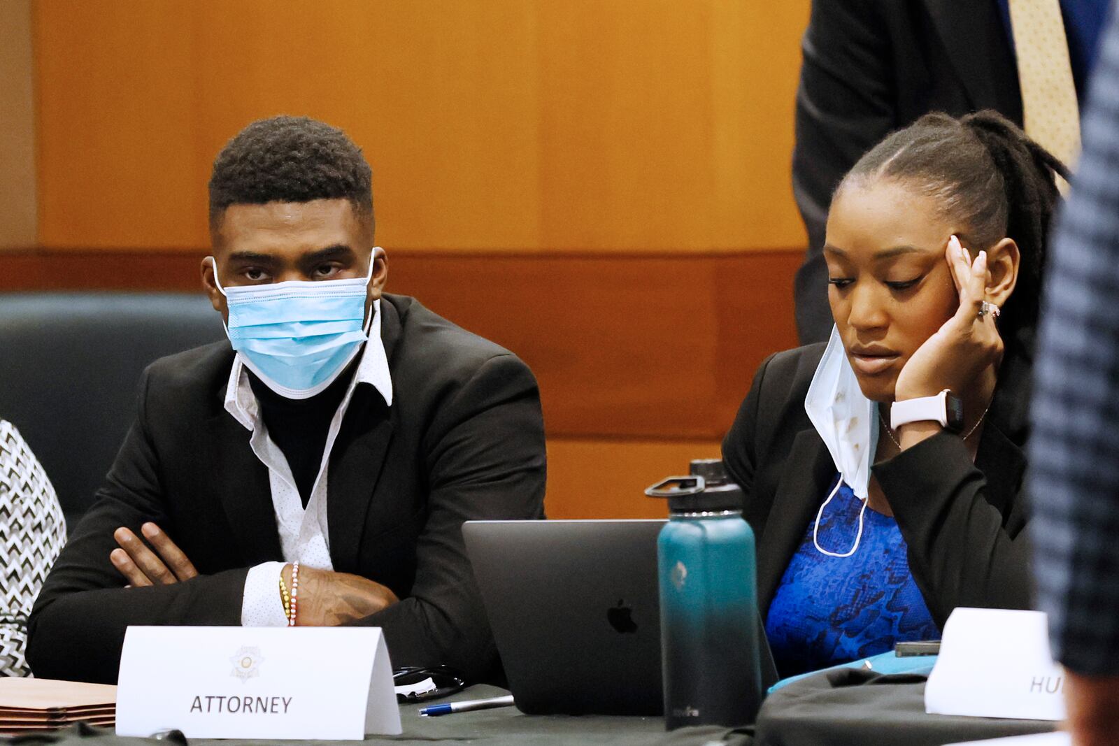 Kahlieff Adams and his attorney Teombre Calland are seen as they wait for the Jury selection portion of the trial to continue in a Fulton County courtroom on Monday, Feb 13, 2023. Miguel Martinez / miguel.martinezjimenez@ajc.com 