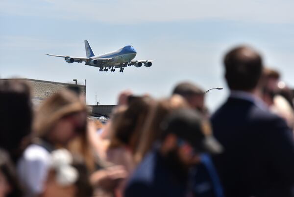 April 24, 2019 Atlanta - Air Force One approaches as people wait to see President Donald Trump and first lady Melania Trump arrive at Hartsfield-Jackson Airport on Wednesday, April 24, 2019. President Donald Trump and first lady Melania Trump addressed the Rx Drug Abuse and Heroin Summit at the Hyatt Regency Hotel in downtown Atlanta on Wednesday afternoon. HYOSUB SHIN / HSHIN@AJC.COM