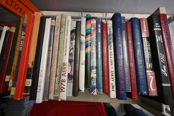 October 15, 2020 Milton - Milton High School's past yearbooks are shown in a stack at Milton High School on Oct. 15, 2020.  Hyosub Shin / Hyosub.Shin@ajc.com