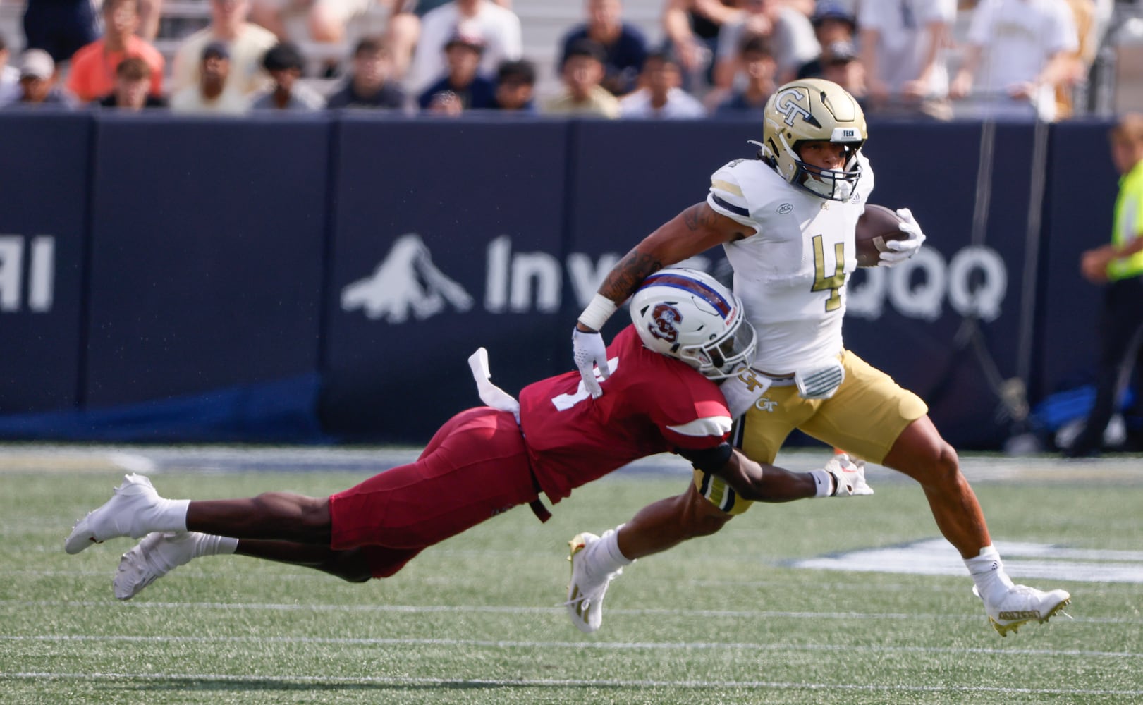 Georgia Tech Yellow Jackets running back Dontae Smith (4) runs for a first down during a football game against South Carolina State at Bobby Dodd Stadium in Atlanta on Saturday, September 9, 2023.   (Bob Andres for the Atlanta Journal Constitution)