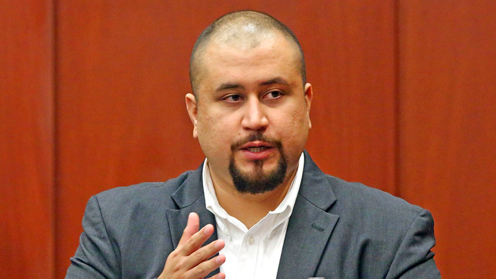 FILE - In this Sept. 13, 2016, file photo, George Zimmerman looks at the jury as he testifies in a Seminole County courtroom in Orlando, Fla. Zimmerman entered a no contest plea in November 2018 to resolve a misdemeanor charge of stalking a private investigator in the latest run-in with the law for the neighborhood watch leader who killed Trayvon Martin. (Red Huber/Orlando Sentinel via AP, Pool, File)