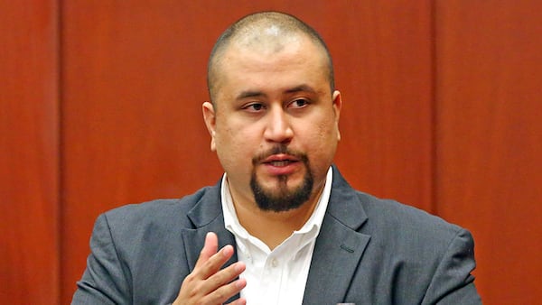 FILE - In this Sept. 13, 2016, file photo, George Zimmerman looks at the jury as he testifies in a Seminole County courtroom in Orlando, Fla. Zimmerman entered a no contest plea in November 2018 to resolve a misdemeanor charge of stalking a private investigator in the latest run-in with the law for the neighborhood watch leader who killed Trayvon Martin. (Red Huber/Orlando Sentinel via AP, Pool, File)