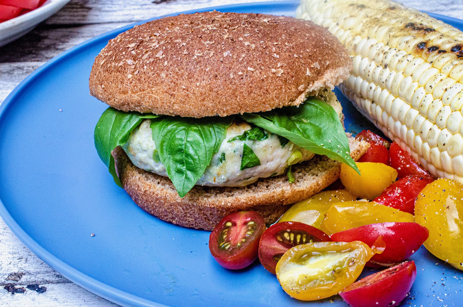 Blue Cheese-Stuffed Turkey Burger with basil on a whole wheat bun
(Virginia Willis for The Atlanta Journal-Constitution)