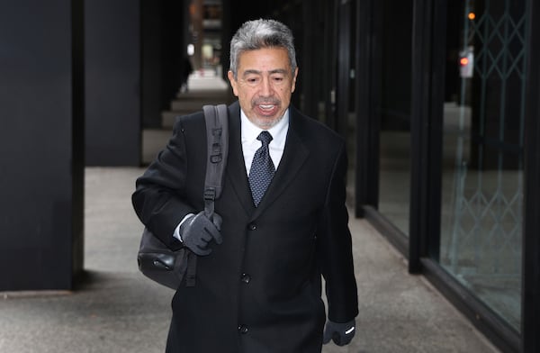 Former Chicago Alderman Daniel Solis leaves the Dirksen U.S. Courthouse in Chicago on Wednesday, Nov. 27, 2024, after another day of giving testimony in the corruption trial of former Illinois House Speaker Michael J. Madigan in Chicago. (Terrence Antonio James/Chicago Tribune via AP)