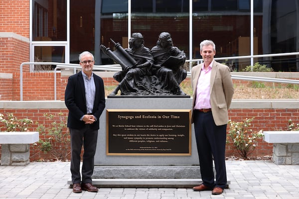 Brendan Murphy, left, who directs the Bearing Witness Institute for Interreligious and Ecumenical Dialogue at the Marist School, with Marist President J.D. Childs. Murphy called Murray Lynn "an extraordinary man." "It was always really hard for him to recount these stories. But in the end, he felt that it was regrettably necessary," Murphy said.