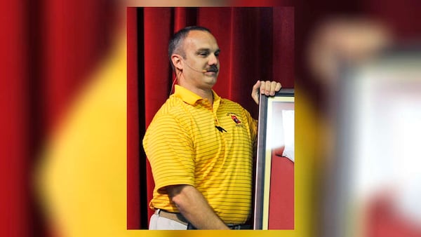 This undated photo shows Chris Hixon, the athletic director at Marjory Stoneman Douglas High School in Parkland, Fla. Hixon was killed when former student Nikolas Cruz opened fire at the school on Wednesday, Feb. 14, 2018. (Susan Stocker/South Florida Sun-Sentinel via AP)