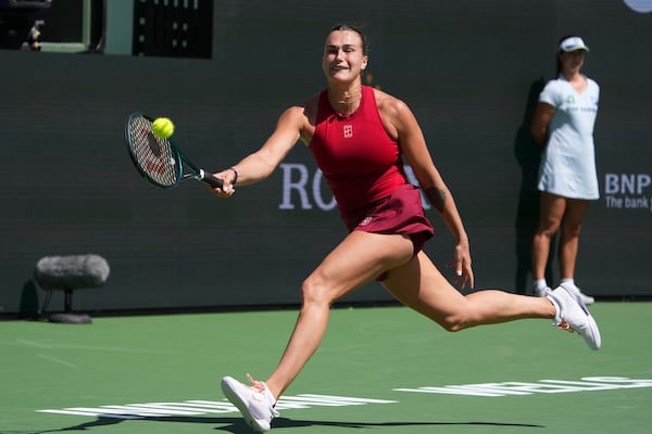 Aryna Sabalenka, of Belarus, returns to Mirra Andreeva, of Russia, during the final match at the BNP Paribas Open tennis tournament Sunday, March 16, 2025, in Indian Wells, Calif. (AP Photo/Mark J. Terrill)