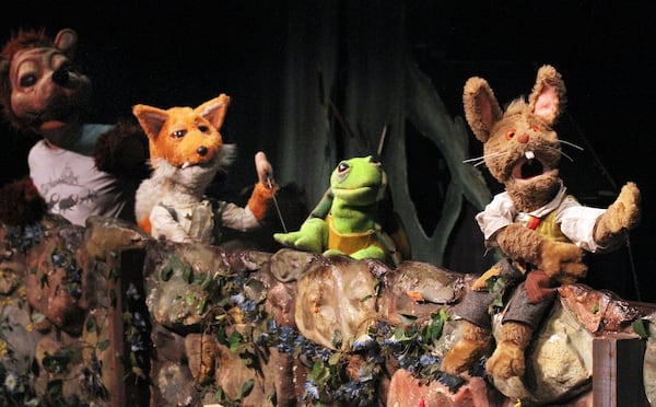 (From left) Tim Sweeney (as Br’er Bear), Dolph Amick (Br’er Fox), Janee Ann Smith (Br’er Turtle) and Jared Brodie (Br’erRabbit) perform during rehearsals for The Center for Puppetry Arts' production of "Br’er Rabbit & Friends."