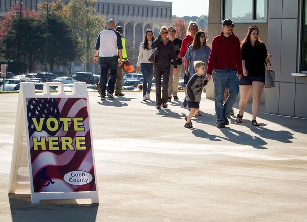 Cobb County residents file into the Cobb County Civic Center in Marietta for early voting on Saturday, Oct. 29, 2016. At least 2,000 people were expected to participate in the early voting there Saturday. STEVE SCHAEFER / SPECIAL TO THE AJC