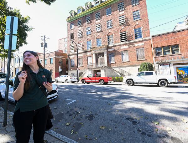 Cynthia Walton, the regional manager for the Park Service’s archeological and historic preservation partnerships, is seen in front of the Butler Street YMCA building Monday, Nov. 8, 2021. (Daniel Varnado/ For The Atlanta Journal-Constitution)