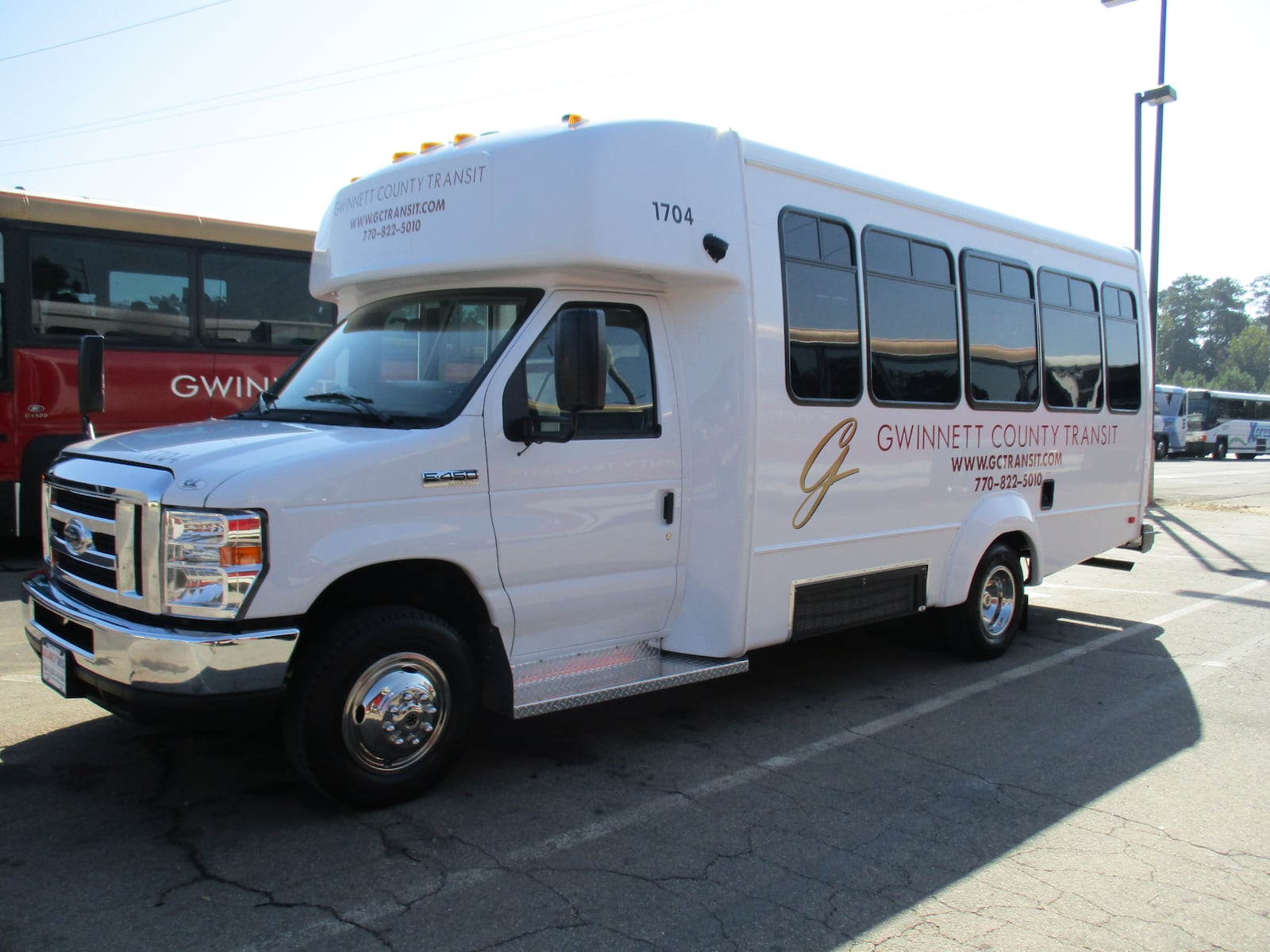 The vehicles used in Gwinnett County's pilot "microtransit" program in Snellville will be similar to the county's paratransit buses, one of which is shown here. (Courtesy of Gwinnett County)