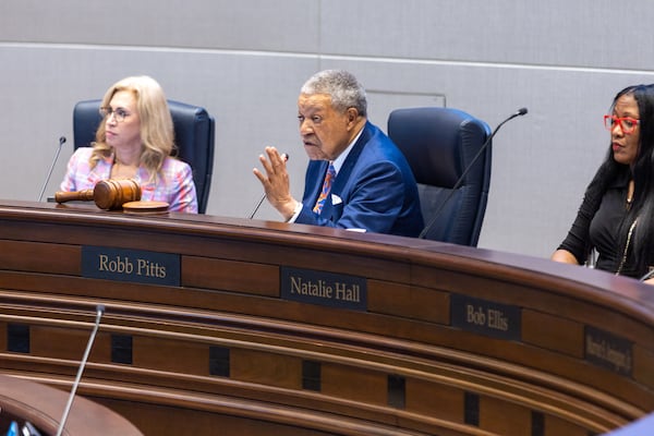 Fulton County Board of Commissioners Chairman Robb Pitts speaks during the public comment portion of the Board of Commissioners meeting in Atlanta on Wednesday, June 7, 2023. On his left is Commissioner Dana Barrett and on his right is Commissioner Natalie Hall. (Arvin Temkar / arvin.temkar@ajc.com)