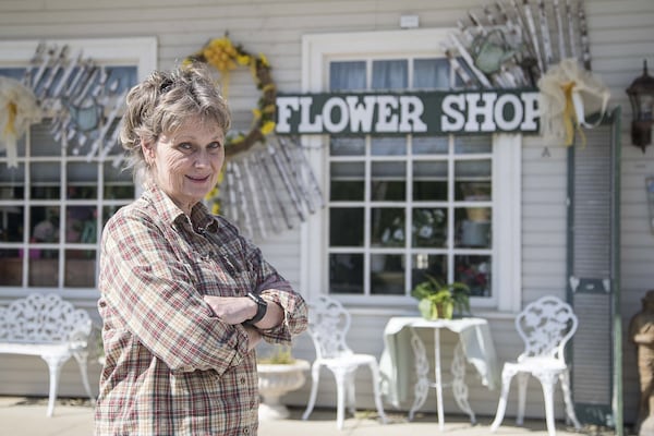 Nikki Fields Scott, at her Old Town Flowers & Gifts, isn’t ready to reopen the downtown Lilburn store to the public. But she is making deliveries. (ALYSSA POINTER / ALYSSA.POINTER@AJC.COM)