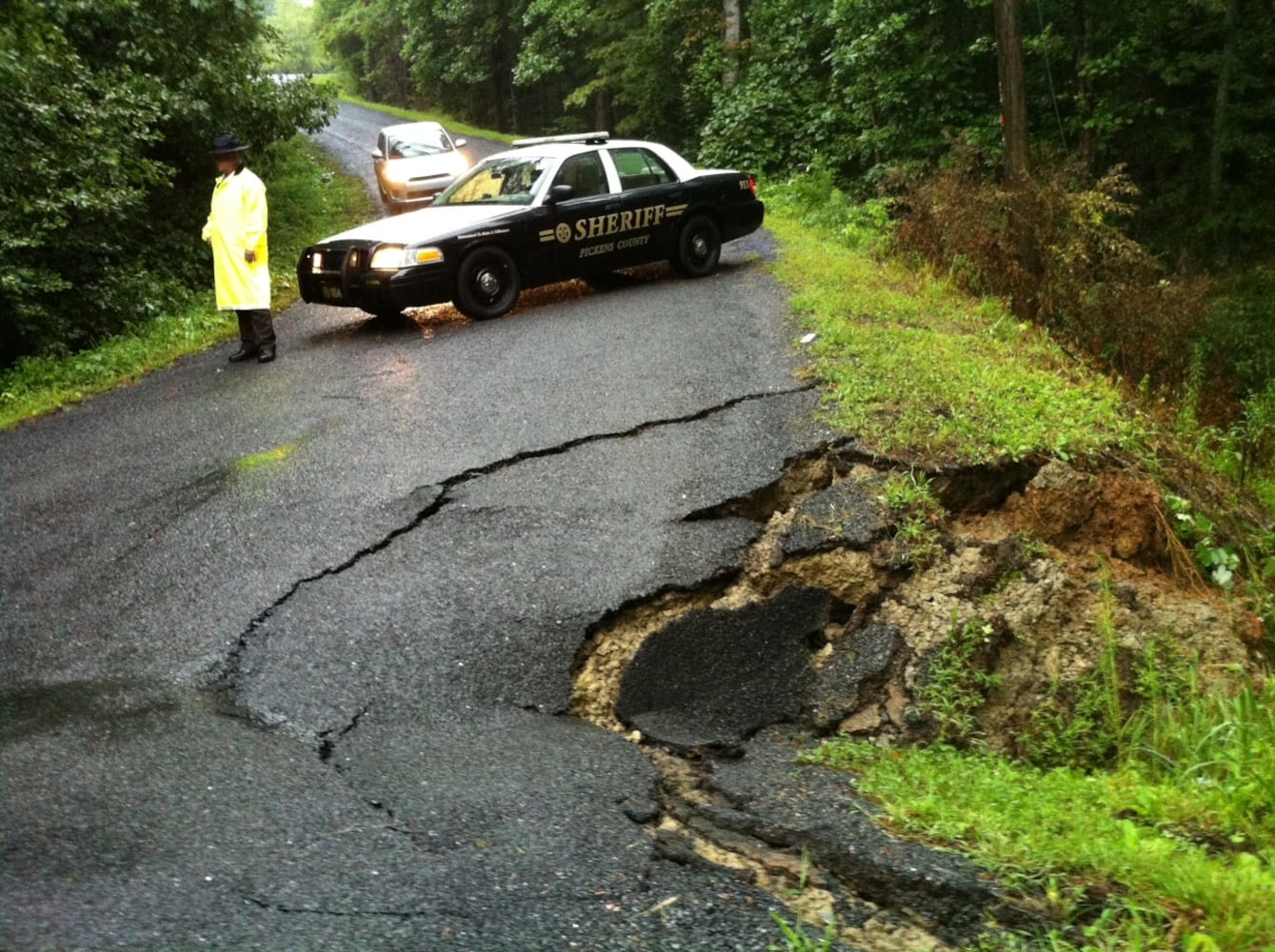 Atlanta Weather| Rain causes road damage, flooding in metro area