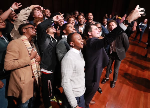 November 18, 2019 Atlanta: Presidential hopeful Pete Buttigieg, Mayor South Bend, Indiana, snaps a selfie with students after speaking while launching a new effort to win over black voters during a conversation at Morehouse College on Monday, November 18, 2019, in Atlanta.   Curtis Compton/ccompton@ajc.com