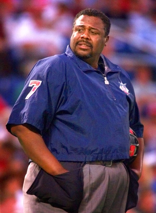 National League umpire Eric Gregg of Philadelphia is shown at the start of the San Diego Padres-Philadelphia Phillies game Tuesday, Aug. 24, 1999 in Philadelphia. Gregg had been slated to be fired by the league. (AP Photo/ George Widman)