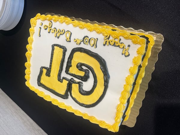 Former Georgia Tech football player Bobby Gaston, a former SEC game official, celebrates his 100th birthday with a Georgia Tech birthday cake Thursday, July 27, 2023, at Savoy Automobile Museum in Cartersville, Ga. His birthday is Oct. 18. (Photo by Chad Bishop/AJC staff)