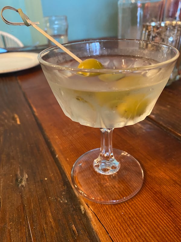 The Sucio at Boho115 is a dirty martini made with anchovy brine, instead of olive juice. Ligaya Figueras/ligaya.figueras@ajc.com