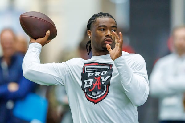 Former Alabama quarterback Jalen Milroe throws during passing drills at Alabama's NFL football pro day, Wednesday, March 19, 2025, in Tuscaloosa, Ala. (AP Photo/Vasha Hunt)