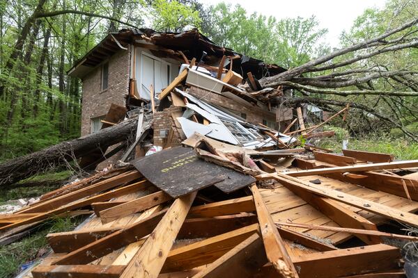 There were no injuries reported when this tree fell through the house at 2940 Brookcliff Way in DeKalb County on Thursday, April 11, 2024.After strong storms producing violent winds moved through overnight, thousands of metro Atlantans woke up in the dark Thursday. The good news is perfect weather is on the horizon. As of 9:30 a.m., Georgia Power reported about 8,500 outages in and around the city and Georgia EMCs showed just under 400 customers without power in the same area. That was down from nearly 60,000 combined outages overnight. “At times last night it almost sounded outside like a tropical storm,” Channel 2 Action News meteorologist Brian Monahan said. “Maybe that woke you up overnight — that consistent, steady, strong wind. We had some gusts up to 50, even 55 mph. That’s what brought down trees and power lines.” Atlanta weather doesn’t stay the same for long, as Atlanta will see a sun-filled weekend with highs in the mid 70s on Saturday and low 80s on Sunday perfect weather to enjoy the outdoors, especially after all the rain washed away much of the pollen. (Photo by John Spink/AJC)