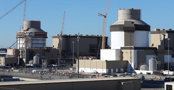 Waynesboro: Exterior construction is seen underway on Unit 4 (at left) beside the first new reactor area (Unit 3) at right, where construction work and remediation of quality problems are going on inside at Georgia Power's Plant Vogtle on Tuesday, Dec 14, 2021, south of Augusta. Curtis Compton / Curtis.Compton@ajc.com