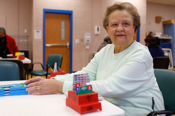 Janet Waymer poses for a portrait during the University Bridge Club’s weekly game at Quality Living Services (QLS) in Atlanta on Tuesday, Jan. 24, 2023.  (Natrice Miller/natrice.miller@ajc.com) 