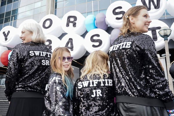 FILE - Fans of Taylor Swift, known as Swifties, pose for a photo as they gather outside Toronto's Rogers Centre to see Swift perform on Nov. 14, 2024. (Chris Young/The Canadian Press via AP, File)