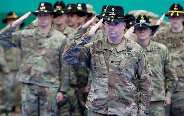 48th Brigade troops salute at their departure ceremony at Fort Stewart. Curtis Compton/ccompton@ajc.com