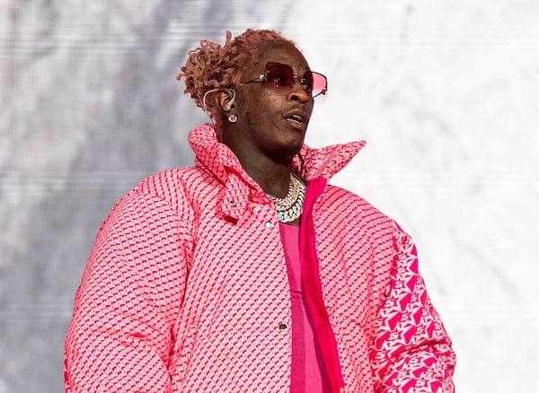 FILE - Young Thug performs at the Lollapalooza Music Festival in Chicago on Aug. 1, 2021.  The rapper says that an apartment concierge let an unknown person take his Louis Vuitton bag holding jewelry, money and about 200 unreleased songs. (Photo by Amy Harris/Invision/AP, File)