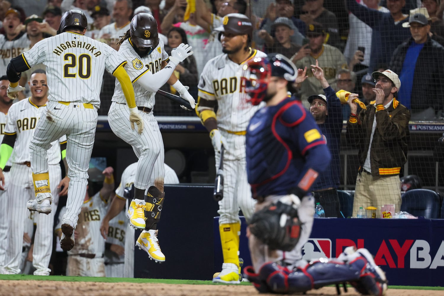 San Diego Padres catcher Kyle Higashioka (20) celebrates a solo home run against the Atlanta Braves during the eighth inning of National League Division Series Wild Card Game One at Petco Park in San Diego on Tuesday, Oct. 1, 2024.   (Jason Getz / Jason.Getz@ajc.com)