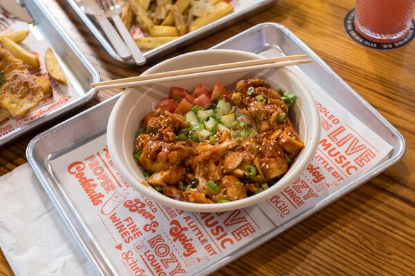 The menu at SchroGlo Community Restaurant & Bar includes the KFC bibimbap bowl. (Stephen B. Morton for The Atlanta Journal-Constitution)

